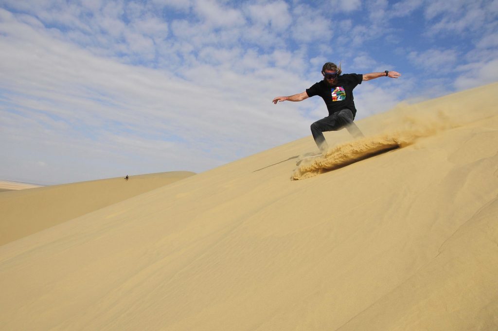 sandboarding- 5 must book tours New Zealand - North Island